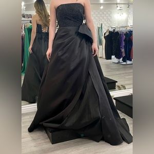 Looking for a prom dress?! Gently used black dress.